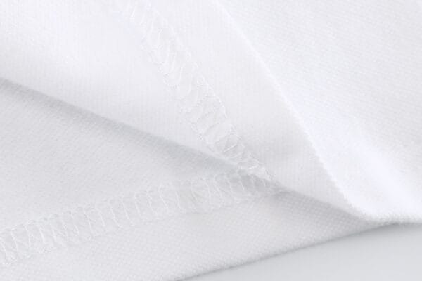 259e6c3b Stylish and Comfortable: Boy's Devon Check Panel Short-Sleeve White Polo