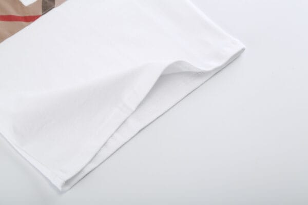 86ff4f8a Stylish and Comfortable: Boy's Devon Check Panel Short-Sleeve White Polo