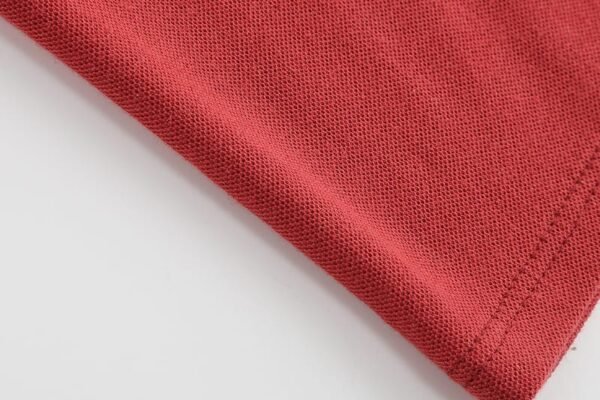 Introducing the Boys' Mini Quentin Rugby Polo - Bright Red
